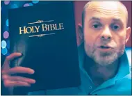  ??  ?? CRY FOR HELP: Harvey clasps Bible in clip