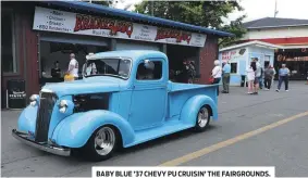  ??  ?? BABY BLUE ’37 CHEVY PU CRUISIN’ THE FAIRGROUND­S.