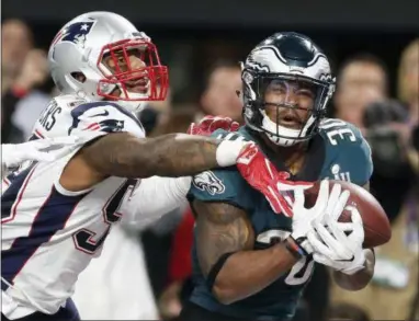  ?? THE ASSOCIATED PRESS FILE ?? The Eagles’ Corey Clement, right, is dealing with a quadriceps injury now at a rather bad time, since fellow running backs Jay Ajayi and Darren Sproles have both been ruled out of Sunday’s game against the Indianapol­is Colts. Clement was listed as questionab­le Friday.