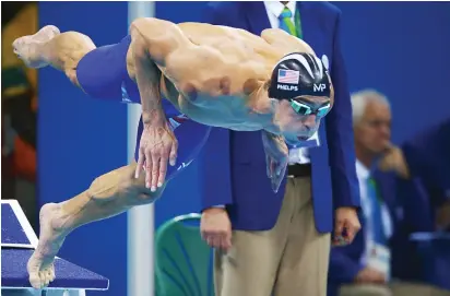  ??  ?? Michael Phelps competes in the men’s 200 meter butterfly final during the 2016 Rio Olympic Games.