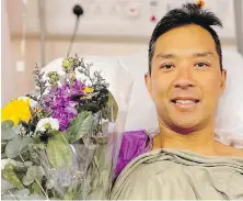  ?? MARIE HUI ?? Christophe­r Won, an assistant fire chief with Vancouver Fire and Rescue, in hospital in Hong Kong.