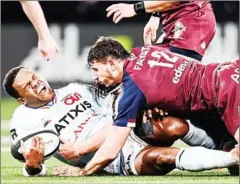  ?? AFP ?? Bordeaux-Begles’ French centre Pablo Uberti (right) tackles Racing 92’s Virimi Vakatawa during the French Top14 rugby union match between both teams at The U Arena in Nanterre, Paris, on Saturday.