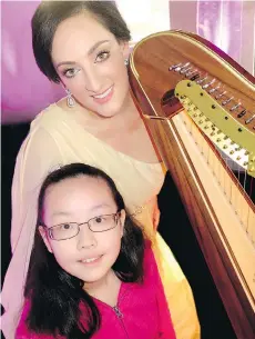  ??  ?? Jessica Hollander chaired a $242,000 gala for the Children’s Wish Foundation that had presented Ida Yang, 11, with a harp she played there. It replaced a borrowed one she had been playing since the age of seven.