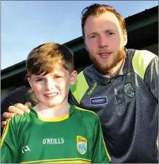  ??  ?? A delighted Luke O’Sullivan poses for a photo with Kerry player Brendan Kealy during the the Kerry GAA Race of Champions Finals Night at the Kingdom Greyhound Stadium on Friday night