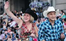  ?? JEFF MCINTOSH/THE CANADIAN PRESS ?? Premier Rachel Notley and Finance Minister Joe Ceci at Friday’s Stampede Parade. Right now, public opinion polls show that the NDP is about as appetizing as a prairie oyster for many Calgary voters, Graham Thomson writes.