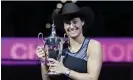  ?? Photograph: Ron Jenkins/AP ?? Caroline Garcia receives the Billie Jean King trophy – and a cowboy hat – after victory in Texas.