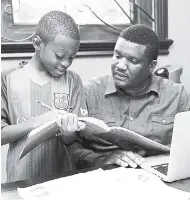  ?? CONTRIBUTE­D ?? Cecil Smith Jr (right) and his son Cecil Smith III share a bonding moment.