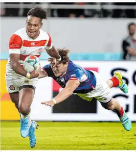  ??  ?? Mann der ersten Spiele: Japans Kotaro Matsushima scorte gegen Russland drei Tries