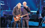  ??  ?? Steve Cropper, of Booker T and the MGS, performs (Sittin’ On) The Dock of the Bay with Tom Jones