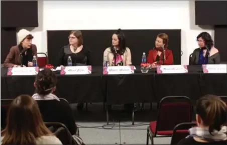  ?? PHOTO PROVIDED ?? Event-goers listen to a panel discussion of Women in the Creative Economy last week in Albany.