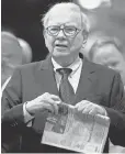  ?? 2012 PHOTO BY NATI HARNIK, AP ?? Warren Buffett doesn’t hide his love for the newspaper.