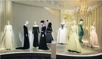  ??  ?? Glamour . . . Dresses and hat creations are displayed at the Yves Saint Laurent Museum in Paris, due to open next week, which will celebrate the life and work of the French designer.