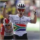  ?? CHRISTOPHE ENA — THE ASSOCIATED PRESS ?? South Africa’s Daryl Impey won Sunday’s 105-mile stage from Saint Etienne to Brioude at the Tour de France.