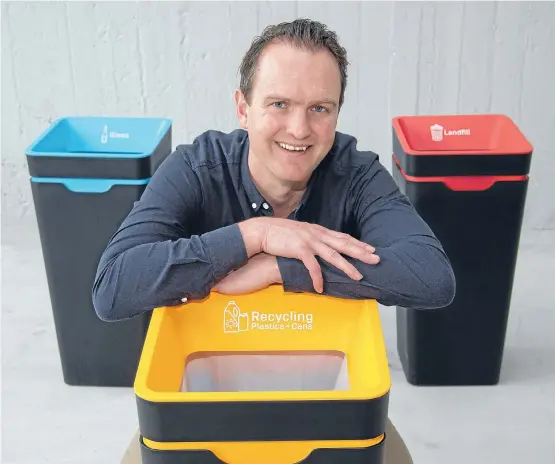  ??  ?? Steven Korner with some of the Method Recycling Bins he and his wife India have created.
Photos: JOHN NICHOLSON/FAIRFAX NZ