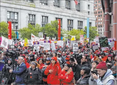  ?? Ashlee Rezin Garcia The Associated Press ?? Striking Chicago Teachers Union and its supporters rally at the Thompson Center after marching at City Hall before Mayor Lori Lightfoot was scheduled to deliver her first budget address during the monthly Chicago City Council meeting Wednesday.