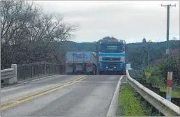  ?? PICTURE / MALCOLM FRANCIS ?? There is no room for error when two heavy vehicles meet on Kawakawa’s bridges.