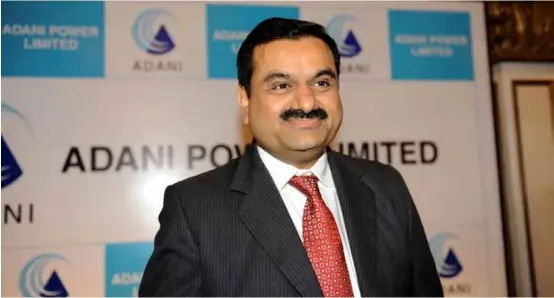  ?? AFP/ VNA Photo ?? Business tycoon Gautam Adani smiles after addressing the media in Ahmedabad.