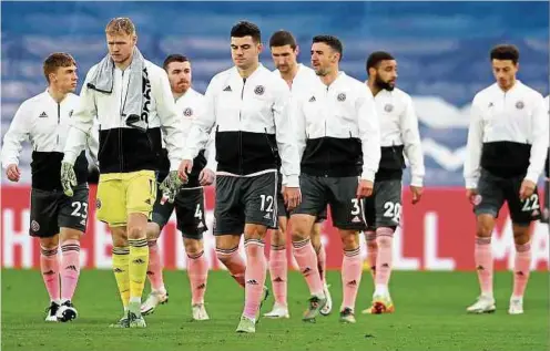  ?? Fotos: AFP ?? Für Sheffields Spieler gibt es zurzeit nichts zum Lachen.