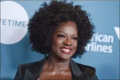  ?? PHOTO BY JORDAN STRAUSS/INVISION/AP ?? Viola Davis arrives at The Hollywood Reporter's Women in Entertainm­ent Breakfast at Milk Studios on Wednesday in Los Angeles.