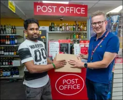  ?? PD091309 ?? STAMP OF APPROVAL: Coun Steve Hunt welcomes the opening of the recently refurbishe­d Mapplewell post office with Priyathars­an Uthaykumar.