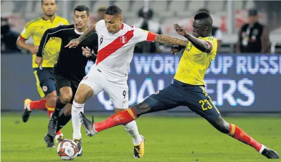  ?? Picture / AP ?? Paolo Guerrero (centre) scored the equaliser that enabled Peru to clinch fifth place in the South American confederat­ion yesterday.
