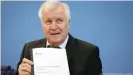  ??  ?? Interior Minister Horst Seehofer is a member of Bavaria's Christian Social Union, part of the ruling conservati­ve bloc led by Chancellor Angela Merkel