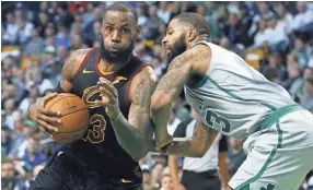  ?? MICHAEL ?? Cleveland Cavaliers' LeBron James drives against Boston Celtics' Marcus Morris earlier this season in Boston. The Cleveland Cavaliers and Boston Celtics are back in the Eastern Conference finals for the second straight year. DWYER/AP