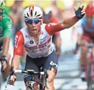  ?? AP ?? Australia’s Caleb Ewan celebrates as he crosses the finish line to win the 11th stage of the Tour de France on Wednesday in Toulouse, France.