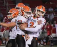  ?? AUSTIN HERTZOG - DIGITAL FIRST MEDIA ?? Perkiomen Valley’s Austin Rowley (23) and Cole Peterlin (3) congratula­te one another after connecting on a long reception in the third quarter against Owen J. Roberts.