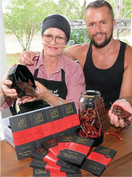  ??  ?? HOT STUFF: Lynne Seaton-Anderson and her son Jason O’Connor with some of Seatonfire’s finest products.