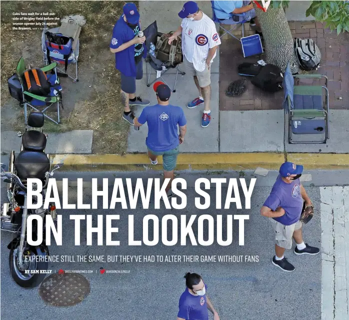  ?? NAM Y. HUH/AP ?? Cubs fans wait for a ball outside of Wrigley Field before the season opener July 24 against the Brewers.