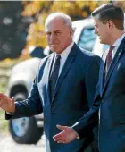  ??  ?? White House Staff Secretary Rob Porter, right, resigned against the urging of Chief of Staff John Kelly, left, who called him a man of integrity and honour.