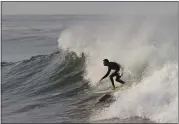  ?? PHOTO BY BAKER CARROLL ?? Ben Kelly, 26, who was killed in a shark attack Saturday, was recalled by a friend as “an explorer to the core — always down to find some uncrowded little mysto wave.”