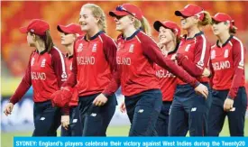  ??  ?? SYDNEY: England’s players celebrate their victory against West Indies during the Twenty20 women’s World Cup cricket match between England and West Indies in Sydney yesterday. —AFP