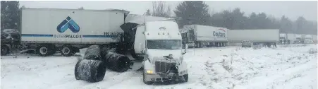  ??  ?? Tractor trailers were among about 30 vehicles involved in two sets of chain collisions Tuesday near Kingston, Ont.