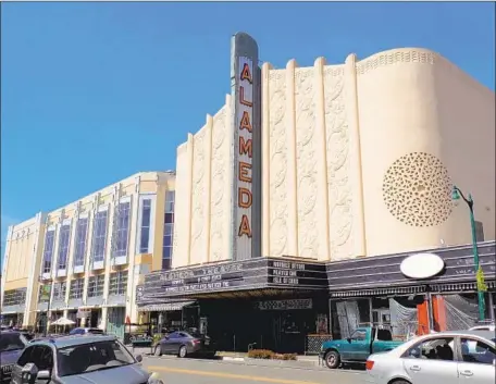  ?? Photograph­s by Irene Lechowitzk­y ?? THE ALAMEDA THEATRE is a 1930s Art Deco landmark in the city’s historic Park Street District, which has restaurant­s and shops.