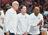  ?? ADRIAN KRAUS/AP ?? Syracuse coach Jim Boeheim, left, retired Wednesday after 47 years of leading the university’s basketball program. Syracuse formally introduced Adrian Autry, right, as the new men’s basketball coach on Friday.