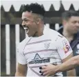  ?? ?? Ayrshire Bulls’ Elias Caven celebrates a first-half try