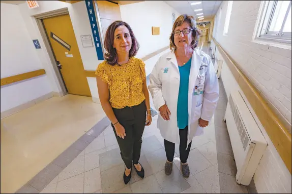  ?? PHOTOS BY JESSE COSTA / WBUR ?? Liz Tadie, left, was the director of substance use disorder services at Salem Hospital, north of Boston. Jean Monahan-doherty, right, a social worker at the hospital, says, “There was finally some recognitio­n across the entire institutio­n that this was a complex medical disease that needed the attention of a specialist.” Tadie is starting a job at another hospital, but Salem Hospital leaders say the program will continue.