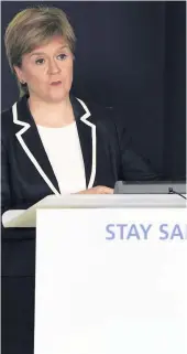  ??  ?? Announceme­nt Nicola Sturgeon sets out the move to level zero on Tuesday