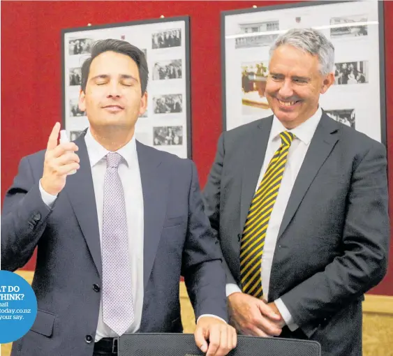  ?? Photo / Paul Taylor ?? National Party leader Bridges trying Deliveranc­e, a body spray created by Boys at St Johns College, accompanie­d by MP for Tukituki Lawrence Yule.