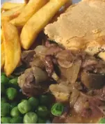  ??  ?? Pigeon pie with chips and peas — the perfect end to an afternoon in pursuit of woodies