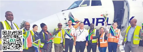  ?? ?? uMhlathuze Mayor Xolani Ngwezi (fourth right) led councillor­s and other stakeholde­rs in welcoming the pilots of Airlink, which landed in Richards Bay on Monday