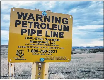  ?? Matthew Brown The Associated Press ?? The Standing Rock Sioux, which draws its water from the Missouri River, says it fears pollution from the Dakota Access pipeline. Energy Transfer says the pipeline is safe.