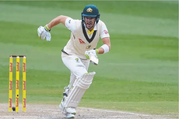  ?? Picture: GETTY IMAGES ?? GO FOR IT: Australia’s Tim Paine heads off for a run on day three of the fourth Test match against South Africa in Johannesbu­rg.