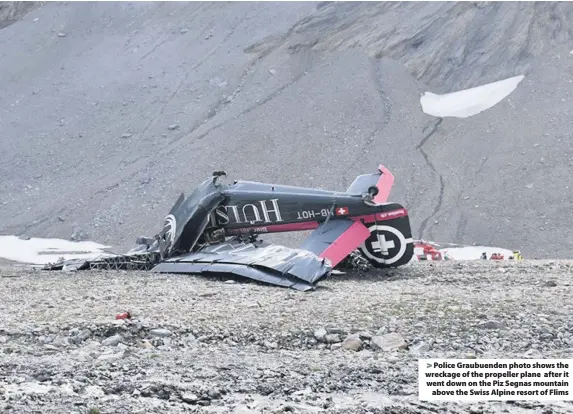  ??  ?? > Police Graubuende­n photo shows the wreckage of the propeller plane after it went down on the Piz Segnas mountain above the Swiss Alpine resort of Flims