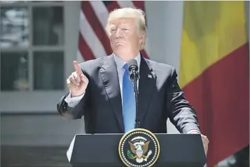  ?? Chip Somodevill­a Getty Images ?? PRESIDENT TRUMP, speaking in the Rose Garden, denied James B. Comey’s accusation that he had tried to interfere with the FBI’s Russia investigat­ion, adding that the agency’s fired director was a “leaker.”