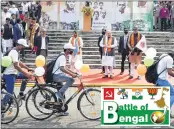  ?? —PTI ?? Union Home Minister Amit Shah watch participan­ts during the cycle rally at National Library in Kolkata on Friday.