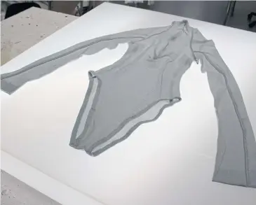  ?? REUTERS ?? The pale grey, long-sleeved ‘Skin II’ bodysuit contains healthy probiotic bacteria, reducing the smell of body odour.