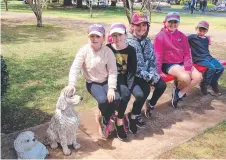  ?? ?? Friends from St Thomas More's Primary School OSHC (from left) Amelia, Tamsyn, Pippa, Grace and Michael spend time together at vacation care.